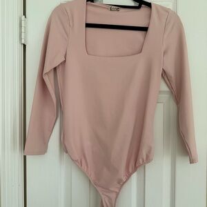 Pink Free People Long Sleeve Bodysuit